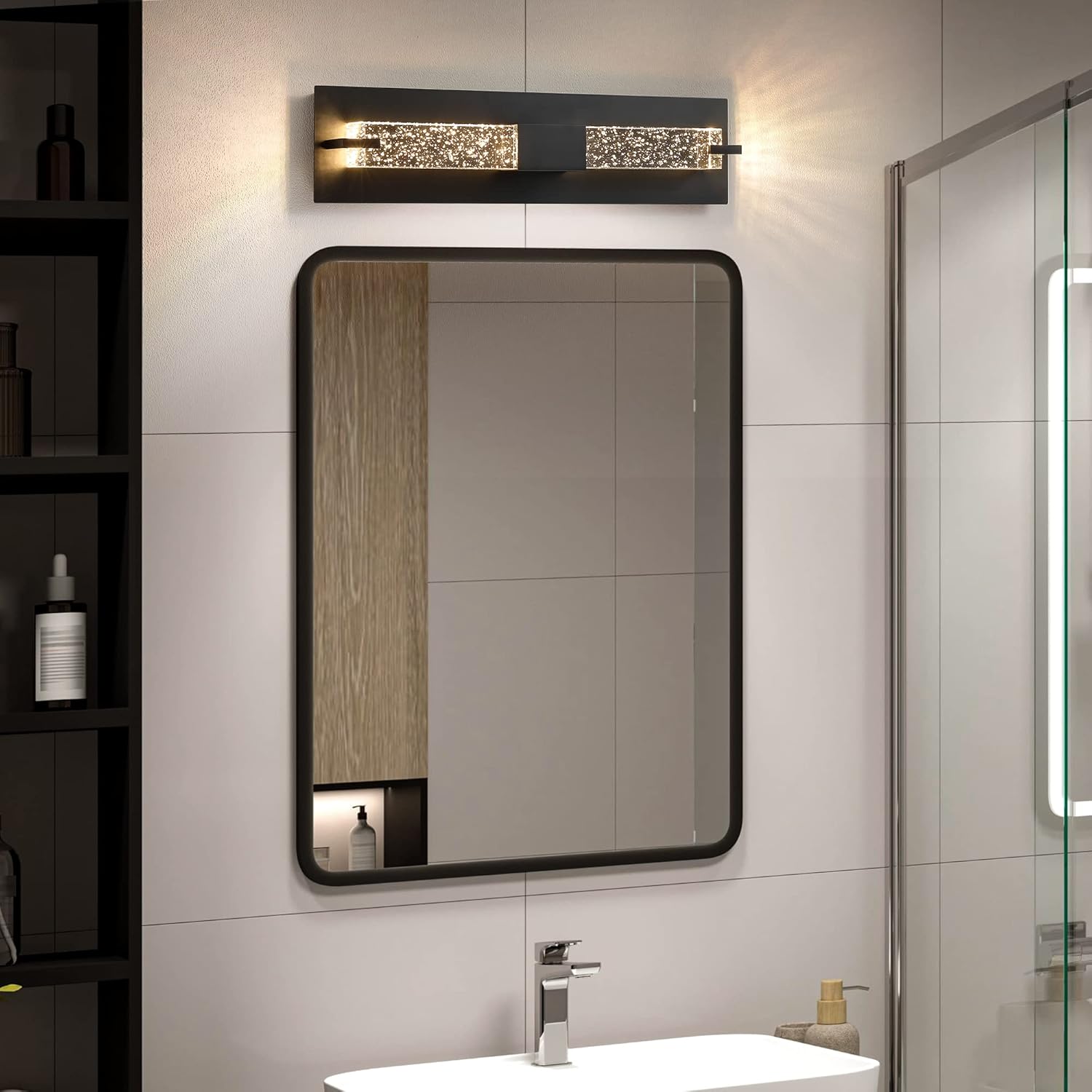Bathroom with a rectangular mirror, light fixture, and sink.
