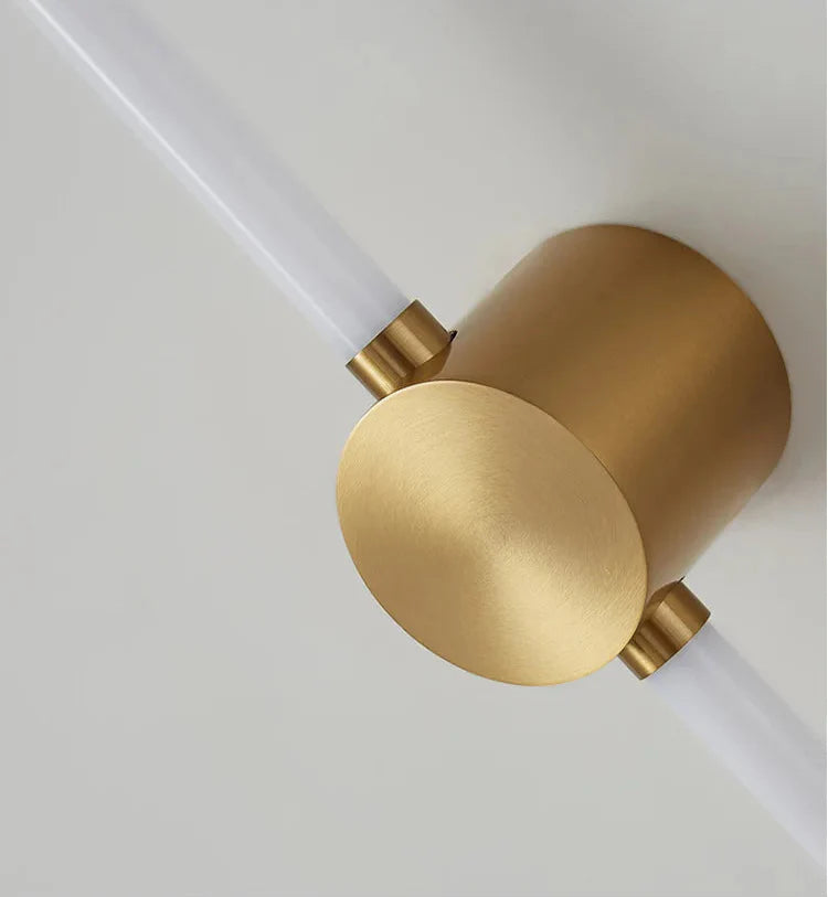 Gold ceiling light fixture on a white background