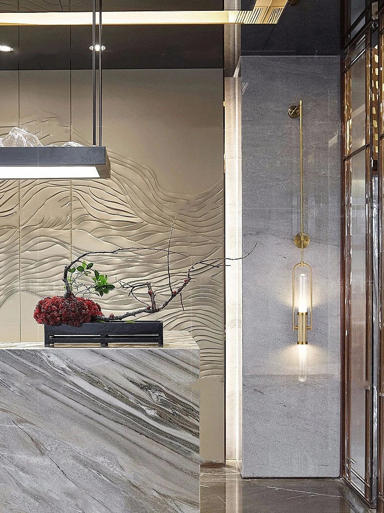 Modern interior design with marble flooring, wall art, and decorative elements.
