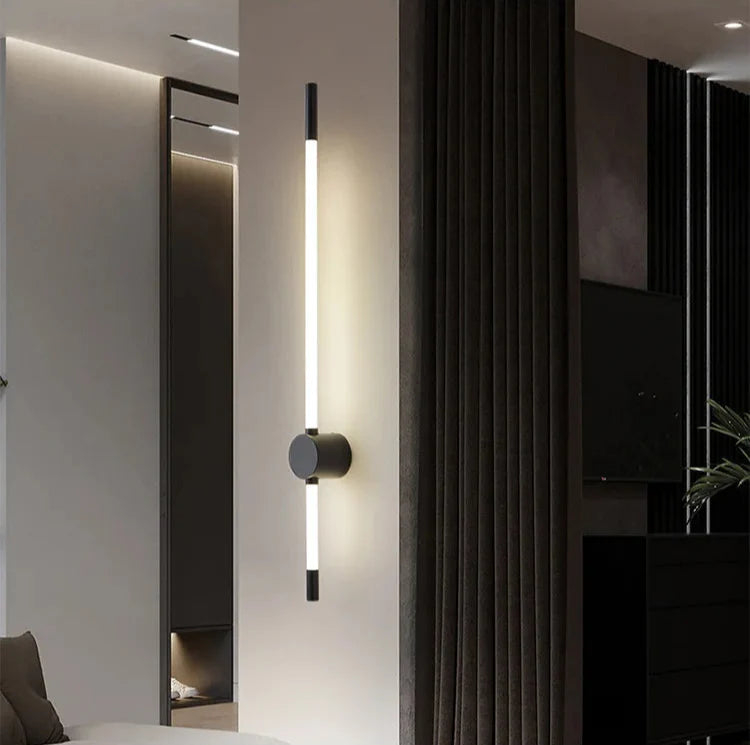 Modern wall-mounted light fixture in a stylish interior setting.