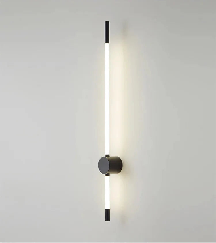 Modern wall-mounted light fixture on a plain wall