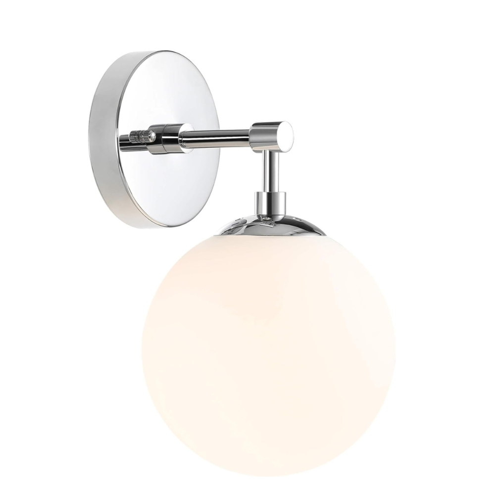 Modern wall light fixture with a round glass shade on a white background