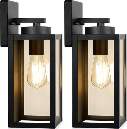 Two black outdoor wall lights with clear glass panels on a white background
