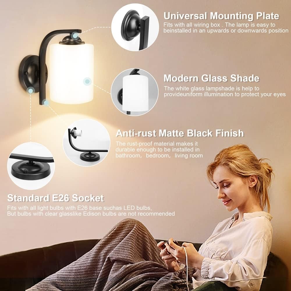 Wall-mounted light fixture with features highlighted, including a woman sitting in the background.